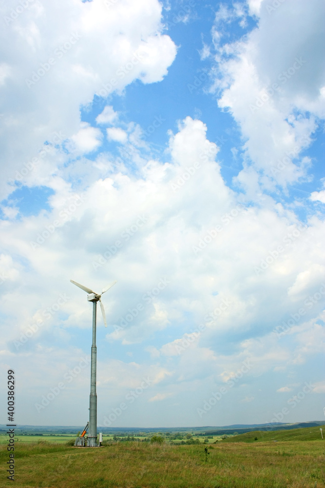 Wind turbines in the field generates electricity Wind turbines in the field generates electricity