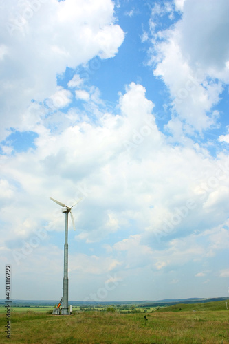 Wind turbines in the field generates electricity