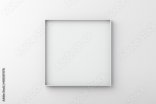 White square frame on an empty wall