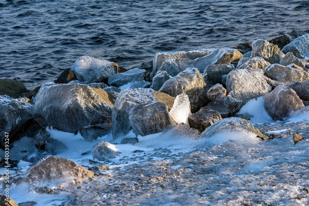 Ice rain series: ice-coverd rocks on the beach