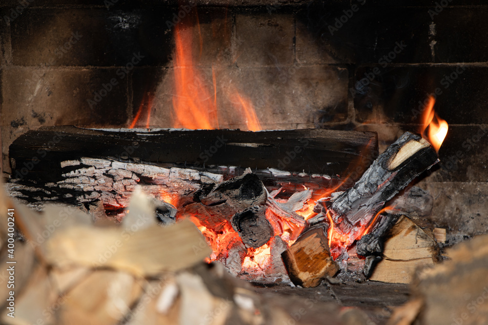 Flames in the fireplace. Burning of log. Flames of fire. Burning fireplace Flames in the fireplace. Burning of log. Flames of fire. Burning fireplace