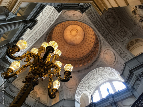 Breathtaking architecture and baroque stucco interiors inside San Francisco City Hall with impressive dome rotunda, a landmark registry office for marriage and weddings photo