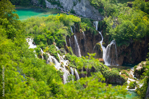 Top view of Plitvice Lakes with waterfalls and surrounding forest