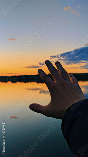 hand and sun