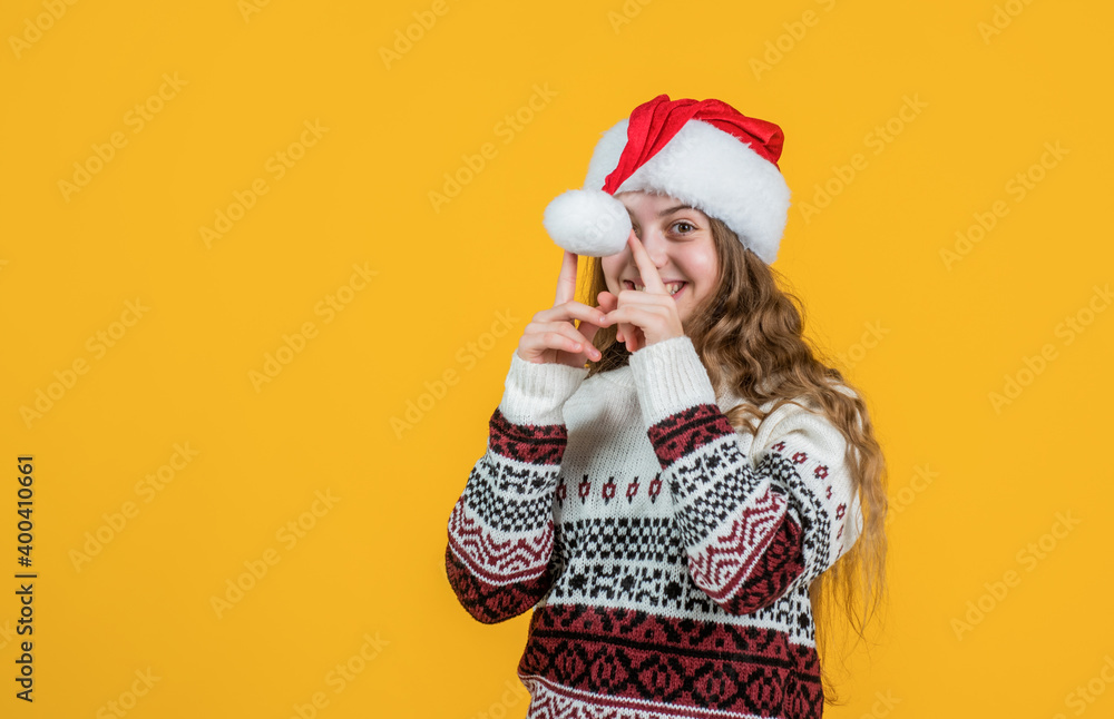just having fun. happy santa claus child. smiling kid in red santa hat and sweater. celebrate winter holidays. christmas shopping time. teen girl feel happiness. sale for presents and gifts just having fun. happy santa claus child. smiling kid in red santa hat and sweater. celebrate winter holidays. christmas shopping time. teen girl feel happiness. sale for presents and gifts