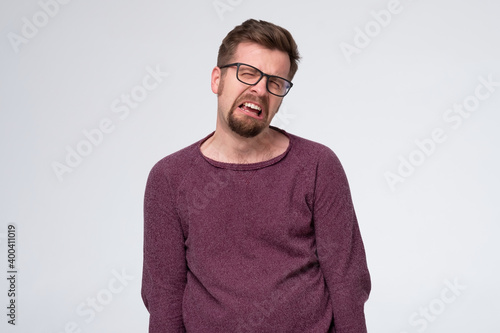 Fototapet Mature caucasian man in glasses crying having troubles