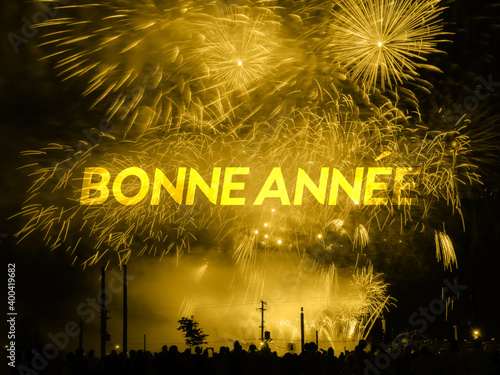 Bonne annee card on a fireworks background photo