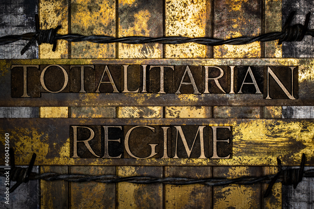 Totalitarian Regime text on grunge textured copper and gold background