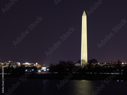 White House and Washington Monument across Tidal Basin at Night. Washington DC, USA.