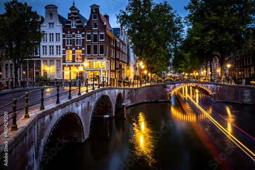 Photography long exposure in the night in amsterdam, canals and bridges