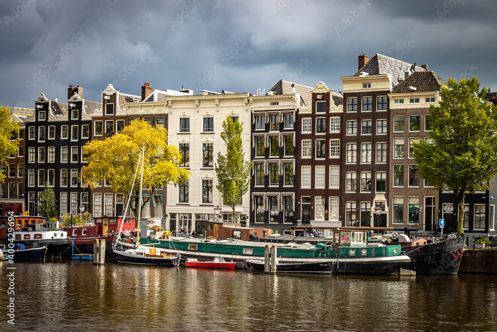 boats on Amstel River in Amsterdam 