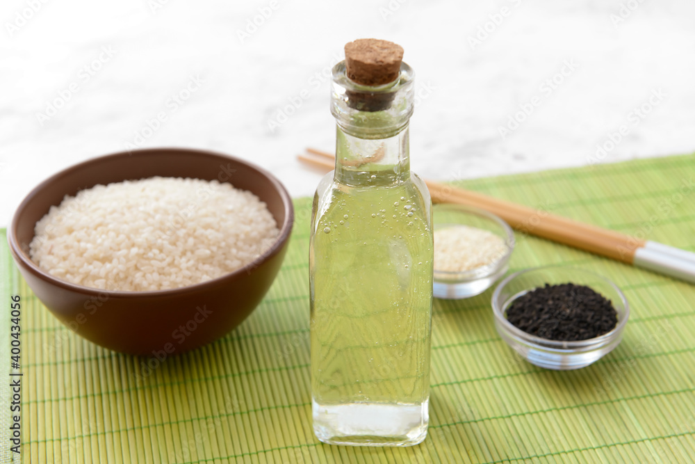 Composition with rice vinegar on table Composition with rice vinegar on table