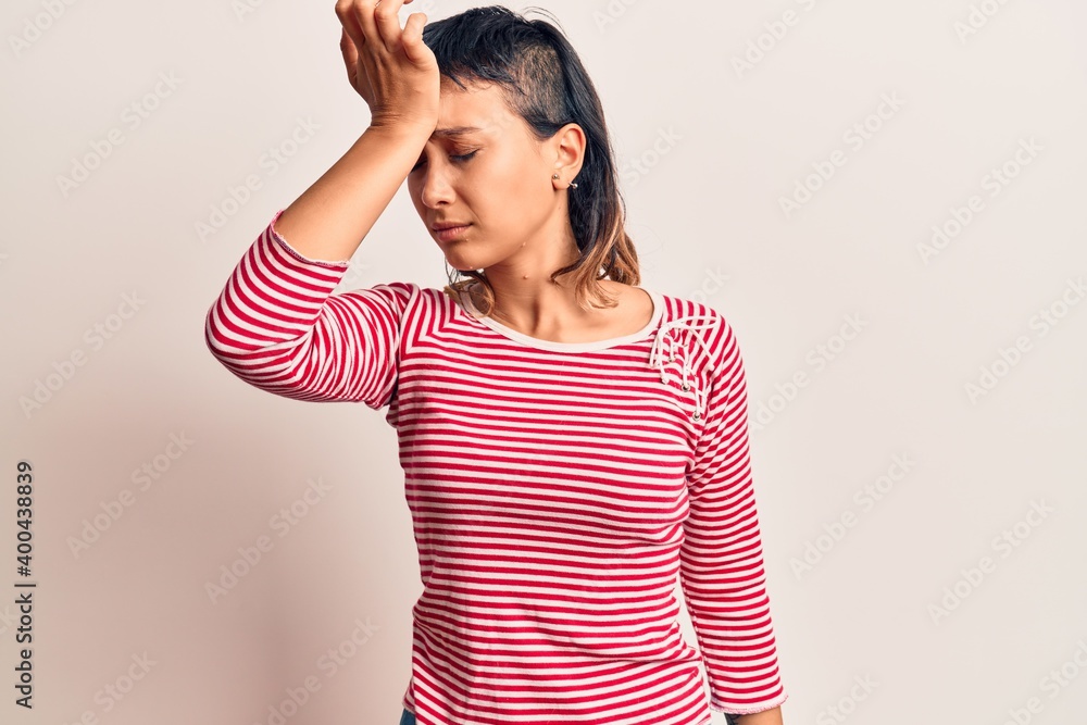Young woman wearing casual clothes surprised with hand on head for mistake, remember error. forgot, bad memory concept. Young woman wearing casual clothes surprised with hand on head for mistake, remember error. forgot, bad memory concept.