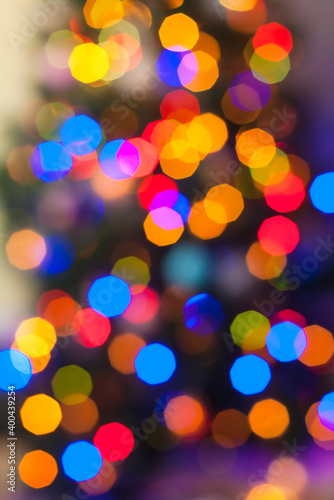 Abstract bokeh background with defocused light on Christmas tree