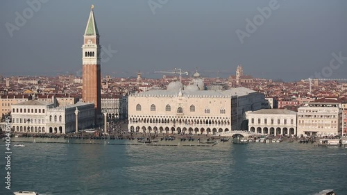Campanila bell tower at piazza San Marco from the other side of a channel, Venice, Italy photo