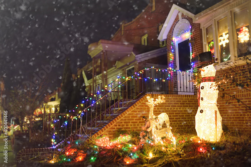 A street decorated for Christmas and New Year holidays in the Dyker Heights neighborhood, New York, USA.