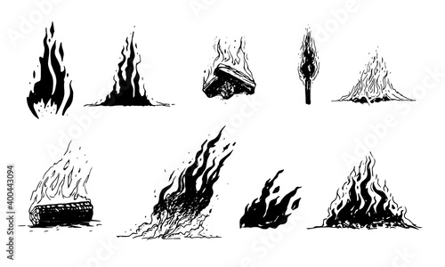Set of hand drawn fire and flame elements. Wood burning, torch and flames isolated on white background.
