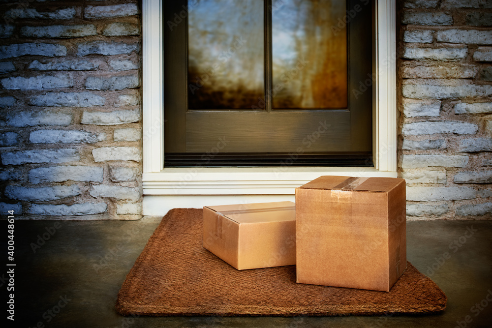 Delivered outside the door, e-commerce purchase boxes on door mat. Add your own copy and label Delivered outside the door, e-commerce purchase boxes on door mat. Add your own copy and label