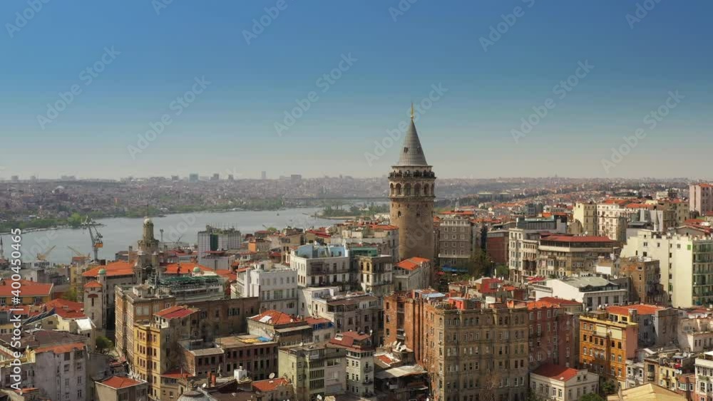 Istanbul, Turkey. Panorama of the Galata Tower in front of skyline. Cone-shaped historical landmark surrounded with old buildings. High quality 4k footage Istanbul, Turkey. Panorama of the Galata Tower in front of skyline. Cone-shaped historical landmark surrounded with old buildings. High quality 4k footage