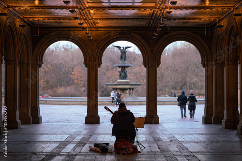 New York City Central Park the Arcade with musician and Bethesda Fountain  photo