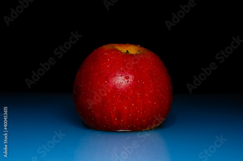 Still life of a red apple on the table