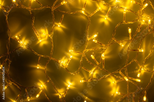 New Year and Christmas yellow garland on the table