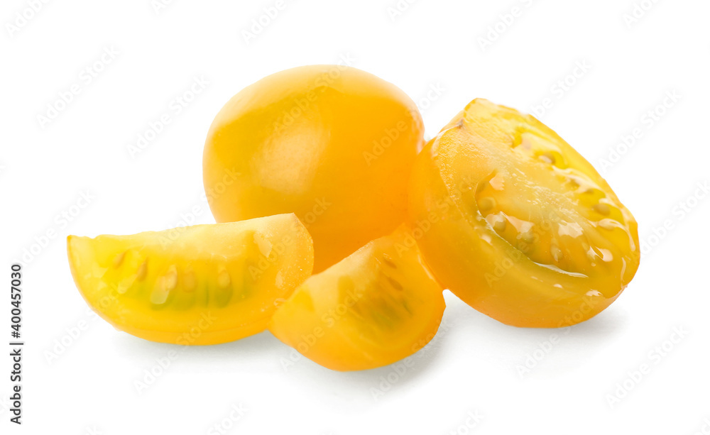 Cut ripe yellow tomatoes isolated on white Cut ripe yellow tomatoes isolated on white