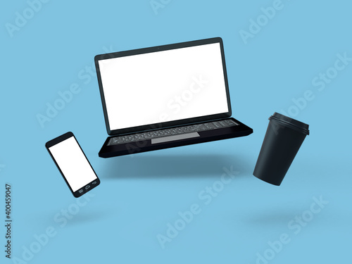 3d flying laptop, smartphone and coffe cup Premium Photo
