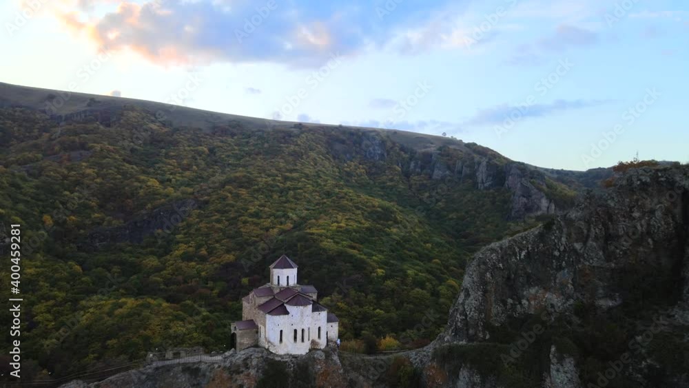 Christian active Shoanin temple. X century. Karachay-Cherkessia, Teberda, Russia. Mountain open. Drone shooting Christian active Shoanin temple. X century. Karachay-Cherkessia, Teberda, Russia. Mountain open. Drone shooting