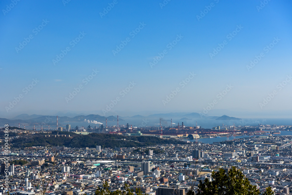 Fukuyama City seen from the top of the mountain. (Residential and industrial area) Fukuyama City seen from the top of the mountain. (Residential and industrial area)