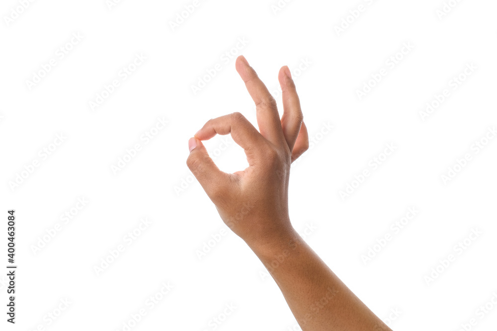 Hand showing okay sign against white background Hand showing okay sign against white background