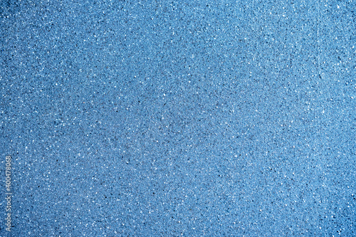 Abstract blue background with glitter and bokeh closeup