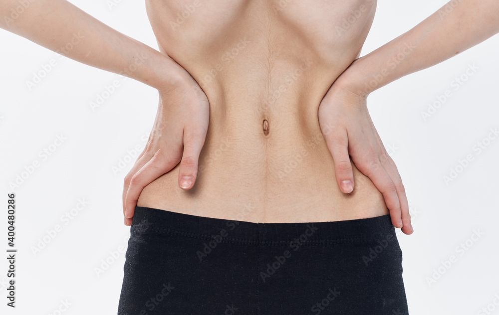 Slim woman narrow waist black leggings calorie diet ribs