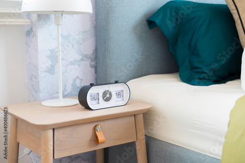 Bild auf Leinwand Cute bear doll on boy bedroom with side table lamp and clock.