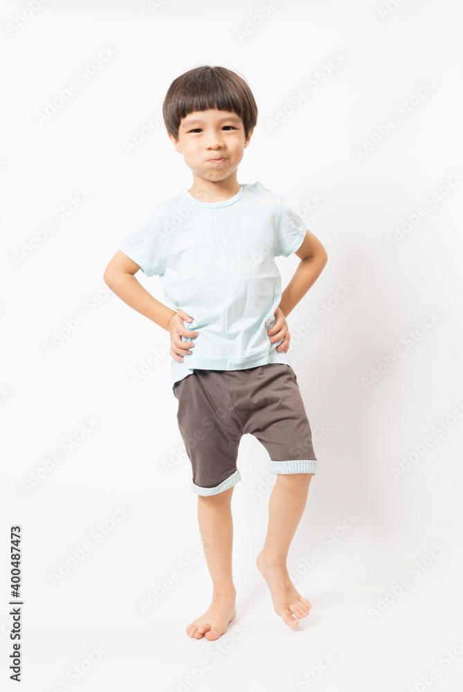 portrait of cute little Asian boy with happy face, he laughing smiles and looking to camera isolated on white background. portrait of cute little Asian boy with happy face, he laughing smiles and looking to camera isolated on white background.