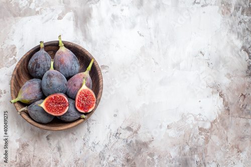 top view fresh figs inside plate on light background photo fruit sweet taste pulp photo