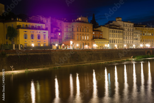 Old city embankment in the night illumination. Florence, Italy