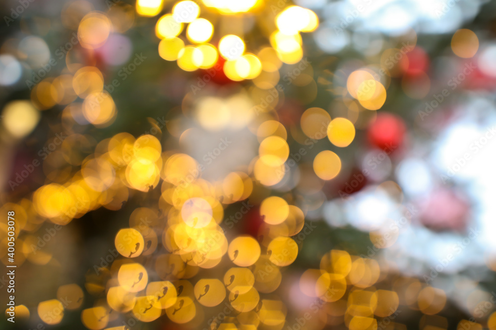 Naklejka premium Bokeh of lights garlands as background.