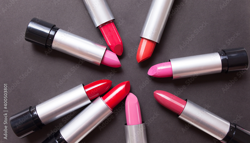 Obraz premium red lipstick on a black background