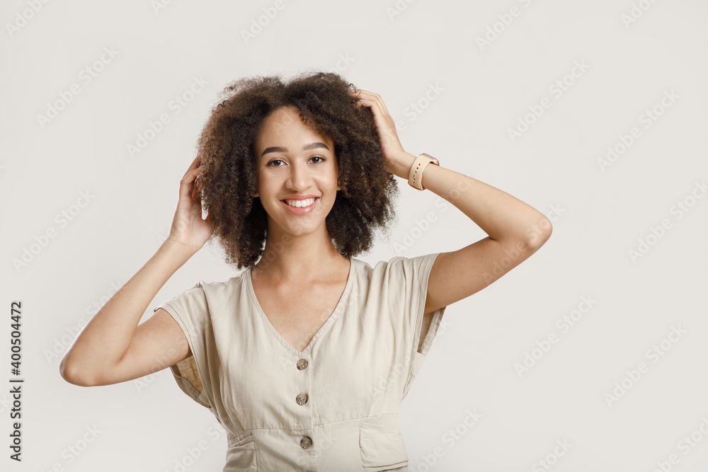 Happy student and natural emotions. Friendly young african american woman Happy student and natural emotions. Friendly young african american woman