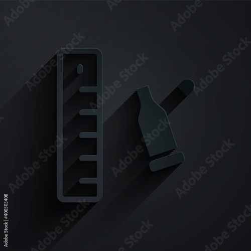 Paper cut Bullet casing as a piece of evidence placed with forensic ruler for documentation icon isolated on black background. Concept of crime scene. Paper art style. Vector.