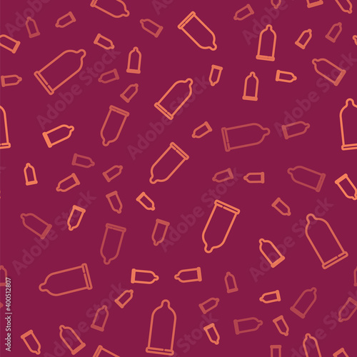 Brown line Condom safe sex icon isolated seamless pattern on red background. Safe love symbol. Contraceptive method for male.  Vector.