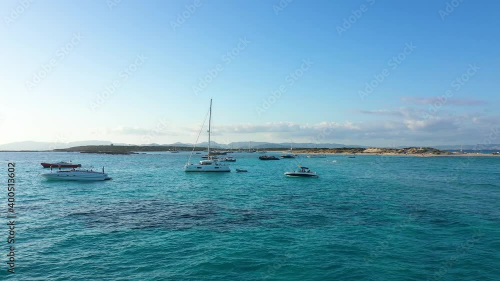 Aerial view of yachts in turquoise water near Formentera. Balearic Islands, Spain Aerial view of yachts in turquoise water near Formentera. Balearic Islands, Spain