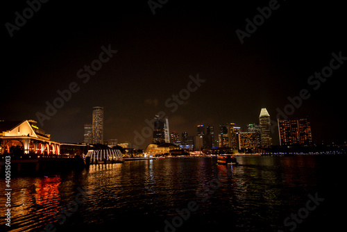 Wallpaper Mural Landscape Singapore at night. Landscape of Singapore building around Marina bay with shadow reflection. Modern high building in business district area at twilight. Torontodigital.ca