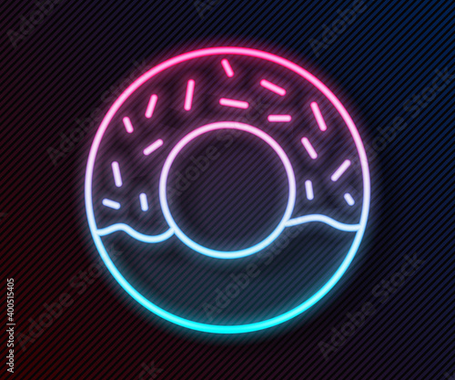 Glowing neon line Donut with sweet glaze icon isolated on black background.  Vector.