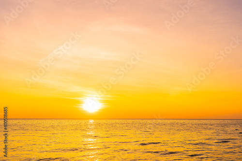 Beautiful landscape of sea beach ocean at sunset or sunrise time © siraphol