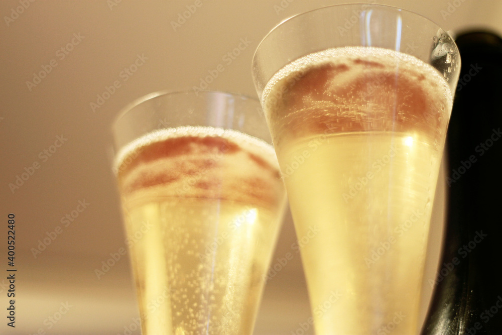 Bottle of champagne and a pair glasses Bottle of champagne and a pair glasses