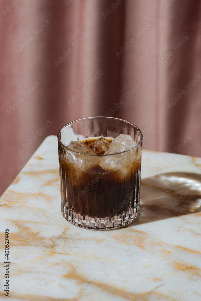 Black Russian, a simple, twopart cocktail combining vodka and Kahlúa