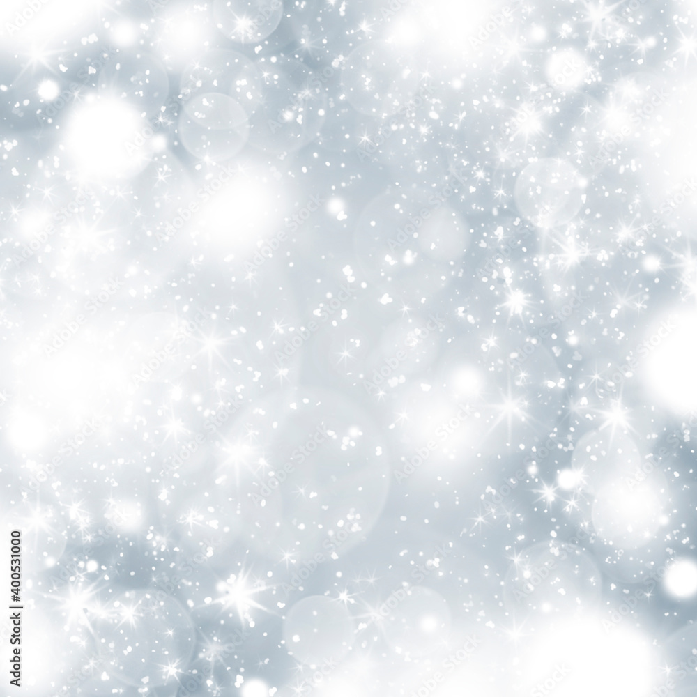 Abstract winter silver and white bokeh background with sparkles