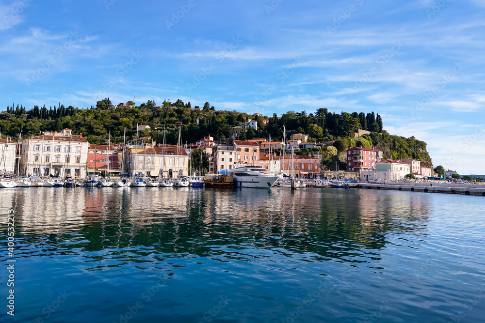A beautiful embankment of the town of Piran on the shores of the Adriatic Sea. A beautiful embankment of the town of Piran on the shores of the Adriatic Sea.